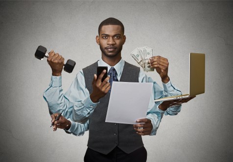 Multitasking business man busy executive on grey background