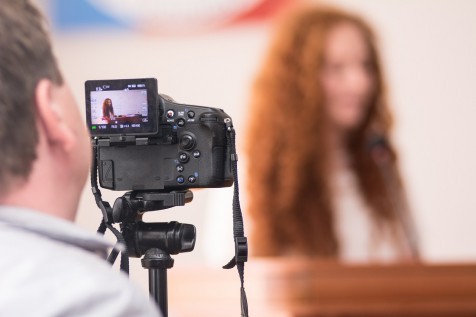 Camera takes a lecturer at the conference